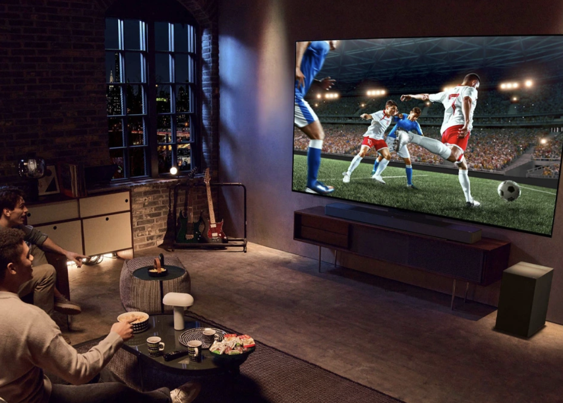 Friends watching sports on LG OLED TV
